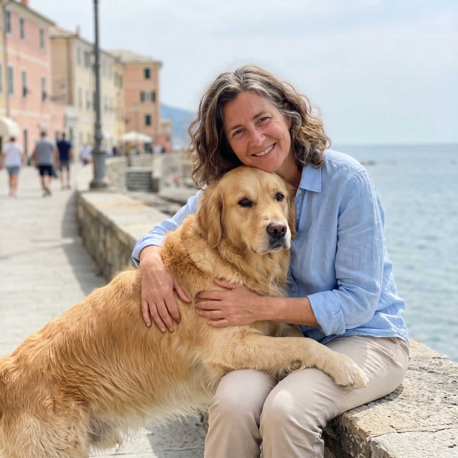 Nina, Golden Retriever, accanto alla sua proprietaria